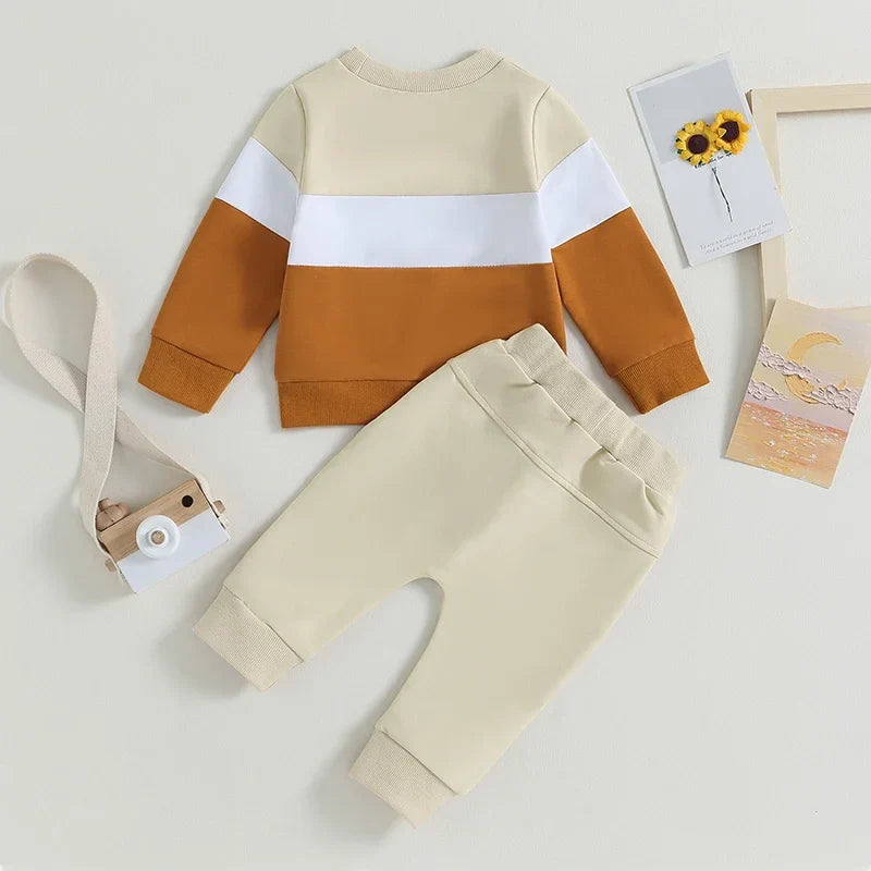 Back view of brown and beige baby autumn suit set.