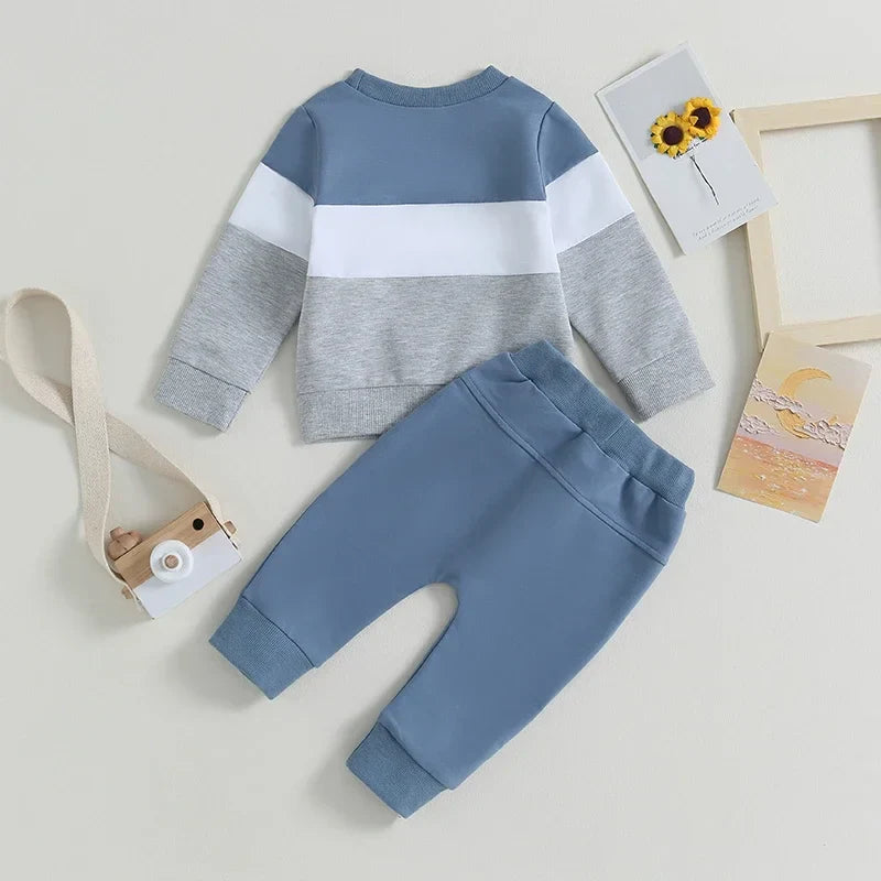 Back view of blue and gray baby autumn suit set.
